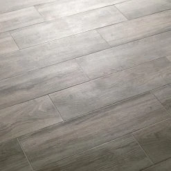 Lifeproof Shadow Wood 6 in. x 24 in. Porcelain Floor and Wall Tile (14.55 sq. ft. / case) -Lifeproof Sales Store shadow wood lifeproof porcelain tile lp33624hd1pr 77 1000